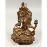 A GILT BRONZE GOD, set with coral and turquoise, 8.5ins high.