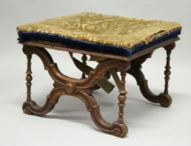 A VICTORIAN WALNUT SQUARE TOP STOOL with needlework top. 20ins.