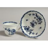 AN 18TH CENTURY WORCESTER COFFEE CUP AND SAUCER panited in blue with lambriquin border, workman's