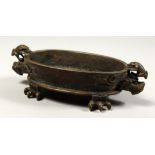 A GOOD CHINESE BRONZE CENSER with dragon handles and claw feet, impressed mark. 7.5ins long.