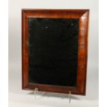 A GOOD WALNUT CUSHION FRAMED MIRROR. 20ins x 15ins.