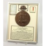 A FRAMED AND GLAZED WW1 BRONZE MEMORIAL DEATH PLAQUE or "Dead Man's Penny" 4579. Private William