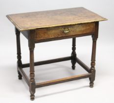 AN 18TH CENTURY OAK SIDE TABLE with a single freize drawer on turned legs united by stretchers.