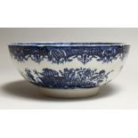 AN 18TH CENTURY POTTERY PEARLEWARE CIRCULAR BOWL with Chinese patterns. 10.5ins diameter, (AF).