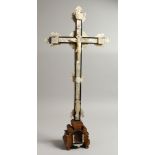AN 18TH CENTURY OLIVE WOOD AND MOTHER OF PEARL JERUSALEM CRUCIFIX. 27ins high.
