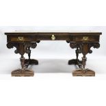 A VICTORIAN WALNUT DESK by MORANT, BOYD & BLANDFORD, 91 NEW BOND ST., the rectangular top of