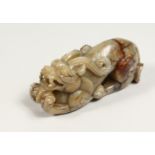 A CARVED JADE DOG OF FOU, 4ins long.