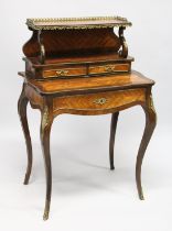 A VICTORIAN LOUIS XV STYLE KINGWOOD BUREAU DE DAME with ornate mounts, the top section with shelf