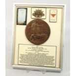 A FRAMED AND GLAZED WW1 BRONZE MEMORIAL DEATH PLAQUE or "Dead Man's Penny" 6141. Private James