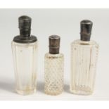 THREE SILVER TOP SCENT BOTTLE.