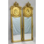 A GOOD PAIR OF LOUIS XVITH DESIGN LONG MIRRORS. 5ft 10ins high x 1ft 6ins wide.