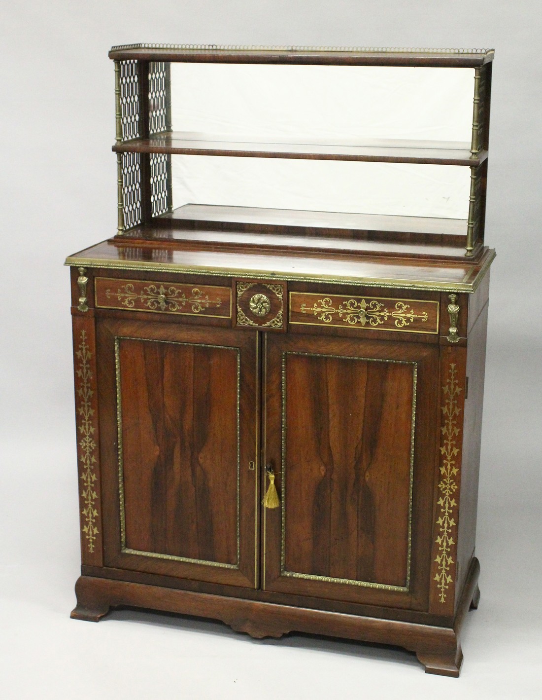 A SUPERB REGENCY ROSEWOOD BRASS INLAID CHIFFONIER in the manner of JOHN MC LEAN, with book shelf