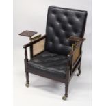 A GOOD 19TH CENTURY MAHOGANY BERGERE LIBRARY ARMCHAIR with cane work back, arms and seat with button