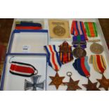 A WWII medal with South East Asia Bar awarded to W.O. J. Nutall 1456558, RAF, together with other