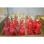 A quantity of chess pieces.