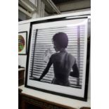 Japanese school, a large photographic print of a young lady holding a fan, framed and glazed.