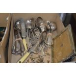 Various flatware and a plated photograph frame.