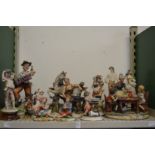 A good collection of Capodimonte and similar figures and figure groups.