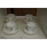Four Shelley cups and saucers, one with a rim chip.