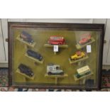 A cased set of model cars and vans.