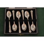 A cased set of six silver coffee spoons.