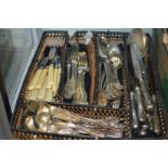 A large quantity of plated wares to include cutlery.