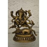 A small bronze figure of Ganesh.