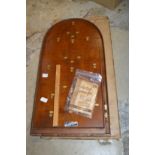 An Elrado Bagatelle game with original box and instructions.
