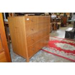 A mid-century four drawer chest.