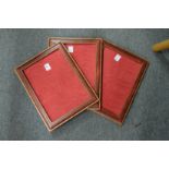 Three Harrods embossed leather photograph frames.