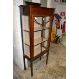 An Edwardian display cabinet.