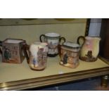 Five Royal Doulton Series Ware jugs and loving cups.