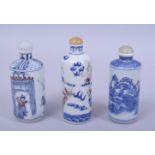 THREE CHINESE BLUE AND WHITE SNUFF BOTTLES, each with iron red decoration, two with marks, 10cm