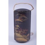 A JAPANESE LACQUER FIVE CASE INRO, with gilt decoration depicting trees and mountains, 9cm.