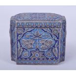 A FINE 19TH CENTURY INDIAN KASHMIRI ENAMELLED SILVER TEA CADDY, with embossed and chased floral