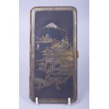 A JAPANESE DAMASCENED MIXED METAL CIGARETTE CASE, with a panel depicting buildings with mount fuji