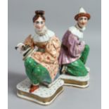 A PAIR OF JACOB PETIT PORCELAIN FIGURES with detachable heads, on square bases. 9ins high.