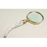 A MAGNIFYING GLASS WITH CUT GLASS HANDLE.