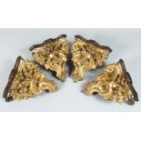 A GOOD SET OF FOUR 18TH CENTURY ITALIAN CARVED AND GILDED WALL BRACKETS, of classical scrolling