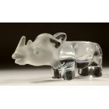 A CLEAR AND FROSTED GLASS ASHTRAY, modelled as a rhinoceros. 9ins long.