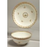 AN 18TH CENTRUY CAUGHLEY RARE FLUTED BOWL AND MATCHING SAUCER SHAPED DISH painted with two doves and