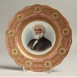 A LATE 19TH CENTRUY CAULDON PLATE painted with a portrait of LONGFELLOW by P. BRUN. Signed, under