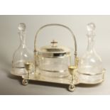 A SILVER PLATED DECANTER AND BISCUIT SET comprising a pair of decanters and oval biscuit barrel.
