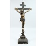 A LARGE 17TH /18TH CENTRUY NAIVE, CHRIST OF THE CROSS with scull and crossbones. 23ins high.