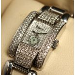 A VERY GOOD CHOPPARD DIAMOND SET WRIST WATCH AND BRACELET. No. 41/ 8380 1093723 8357. Box with