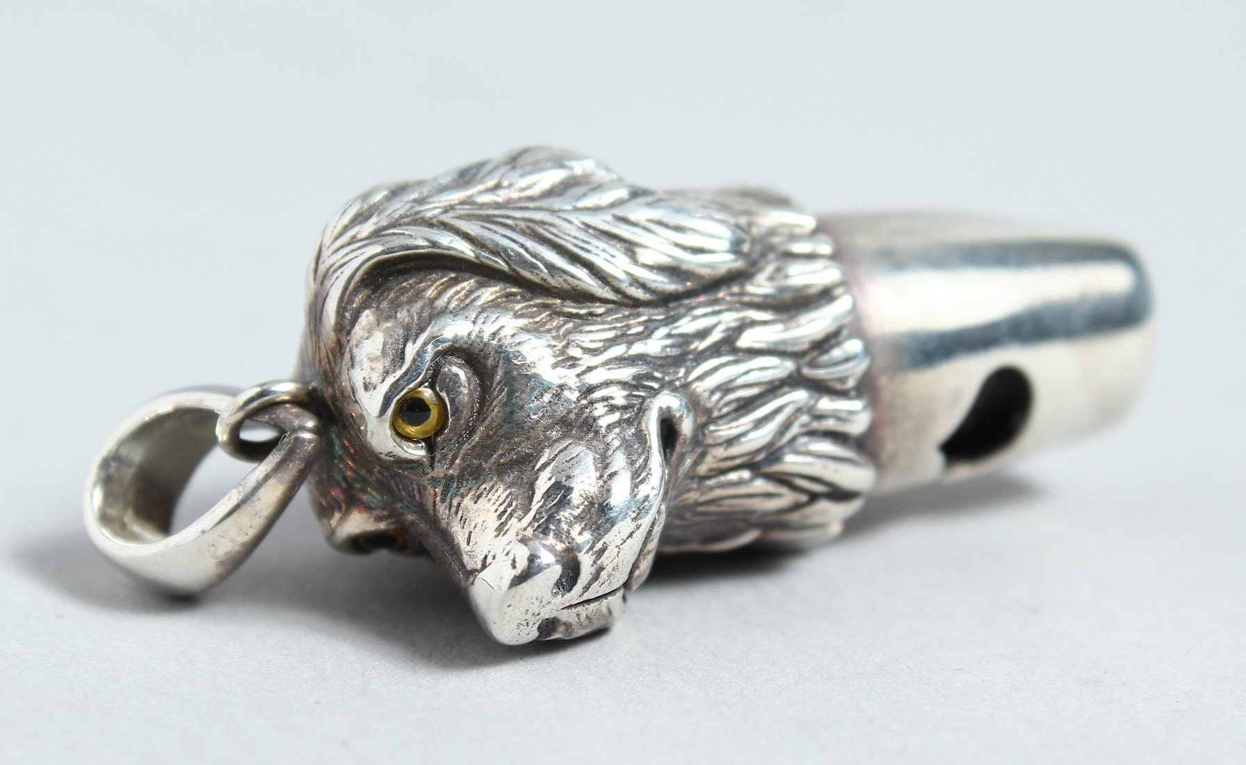 A SILVER DOG'S HEAD WHISTLE