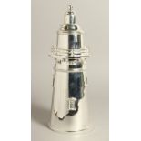 A SILVER PLATED LIGHTHOUSE COCKTAIL SHAKER