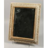 A GOOD FRAMED LIMEWOOD MIRROR. 15ins x 11ins.