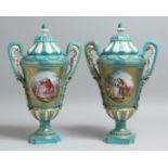 A VERY GOOD PAIR OF 19TH CENTURY SEVRES PORCELAIN TWO HANDLED URN SHAPED VASES AND COVERS, blue