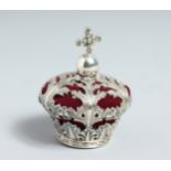 A SILVER CROWN PIN CUSHION.